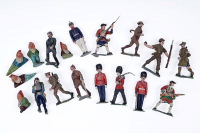 Lot 660 - A collection of hand painted lead soldiers; with selection of painted gnomes