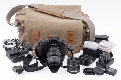 Lot 747 - A Fujifilm X-T1 digital camera; a Lavievert camera bag; and other items
