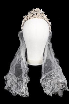 Lot 691 - A 1940's British bridal orange-blossom wax wedding crown and veil
