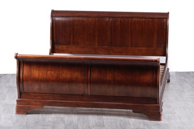 Lot 87 - A 20th Century mahogany sleigh bed