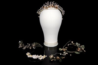 Lot 679 - A 1920's bridal wax flower crown; and Edwardian and later flower girl crowns