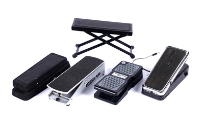 Lot 172 - Four guitar pedals; and a foot rest