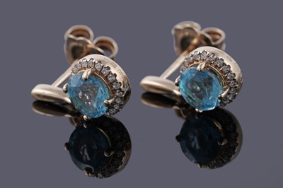Lot 96 - A pair of Clogau Swiss-blue topaz and diamond drop earrings