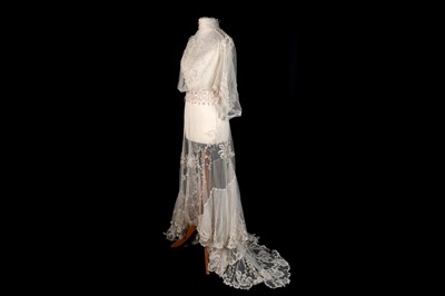 Lot 680 - An Edwardian lace bridal gown