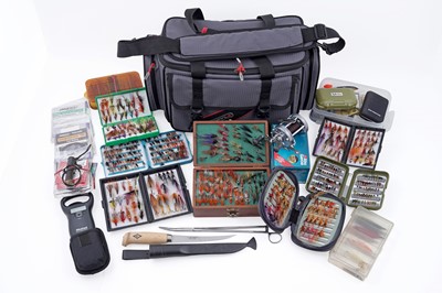 Lot 772 - A collection of fly fishing tackle and flies in a Greys ‘Prowla’ tackle bag