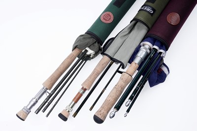 Lot 774 - A collection of three fishing rods, with slips and tubes