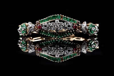 Lot 921 - An emerald, ruby and diamond bracelet