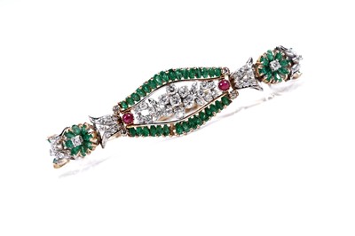 Lot 921 - An emerald, ruby and diamond bracelet