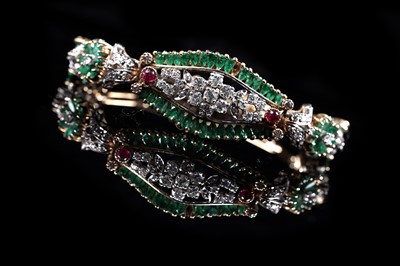 Lot 921 - An emerald, ruby and diamond bracelet