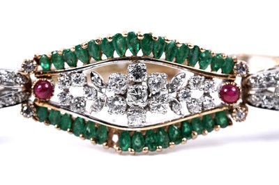 Lot 921 - An emerald, ruby and diamond bracelet