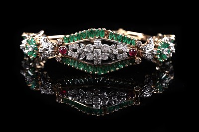 Lot 921 - An emerald, ruby and diamond bracelet