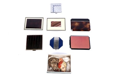Lot 688 - Two 1930s "fabulous faces" brooches; and compacts