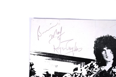 Lot 221 - A page from Disc Magazine signed by Queen