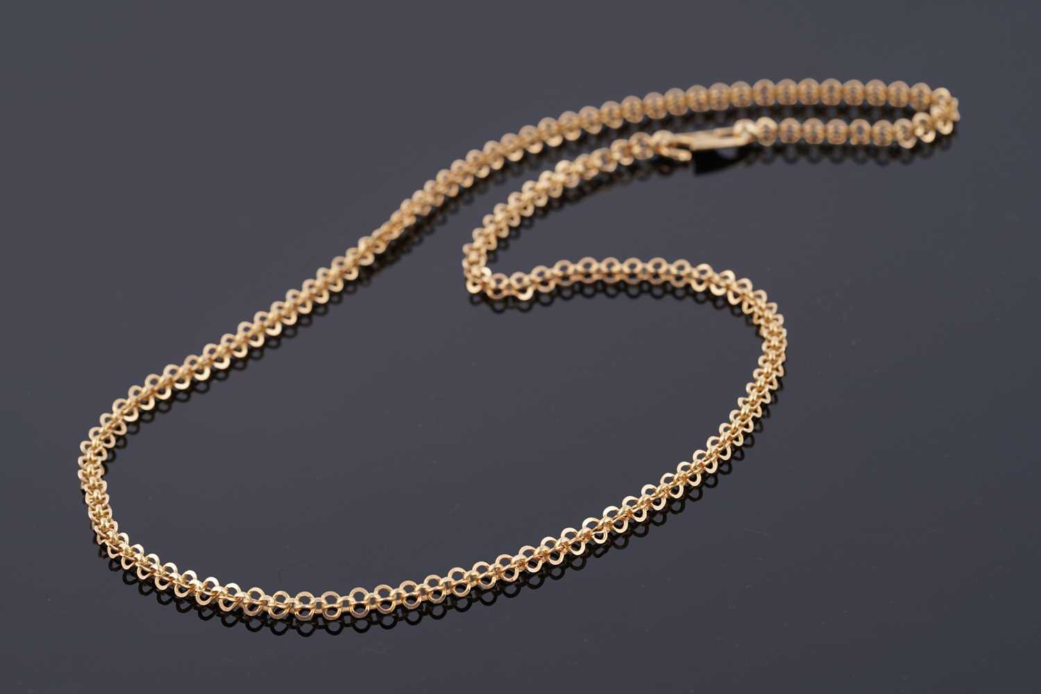 Lot 115 - An Indian 22ct gold fancy-link necklace