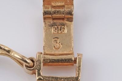 Lot 118 - An Indian 22ct gold flat curb-link bracelet