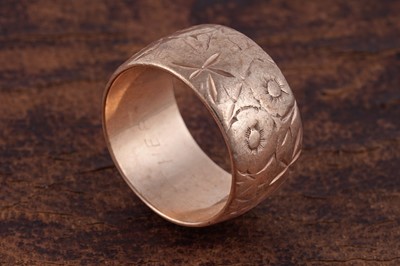 Lot 124 - A 9ct rose gold wedding band