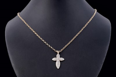 Lot 131 - A diamond quatrefoil pattern cruciform pendant
