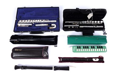 Lot 361 - Two flutes; a recorder; and other woodwind instruments