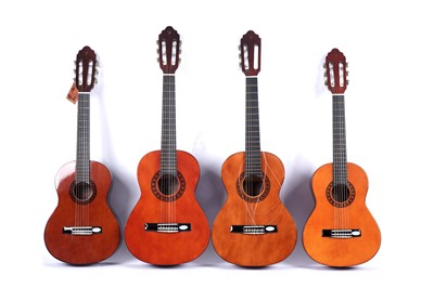 Lot 381 - Two Valencia 1/2 size guitars; and two 1/4 size