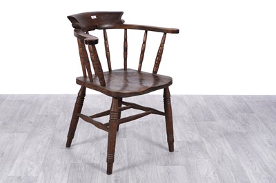 Lot 1 - A late 19th Century beech and elm smoker’s chair