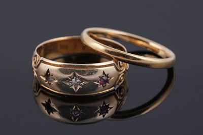 Lot 24 - A Victorian Gothic Revival ruby and diamond ring; and a 22ct gold wedding band