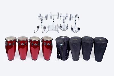 Lot 419 - Four Pearl Percussion Primero Pro Series conga drums; and four Majestic marching harnesses