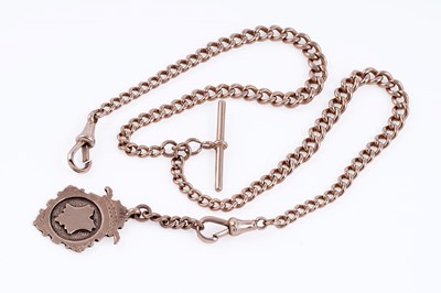 Lot 23 - An early 20th Century 9ct rose gold double "Albert" watch chain and fob