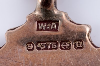 Lot 23 - An early 20th Century 9ct rose gold double "Albert" watch chain and fob