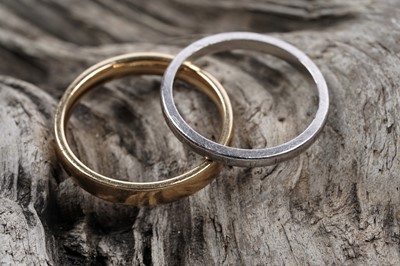 Lot 146 - An 18ct gold wedding band; and a platinum wedding band