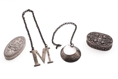 Lot 273 - Two silver wine labels; and two silver pill boxes