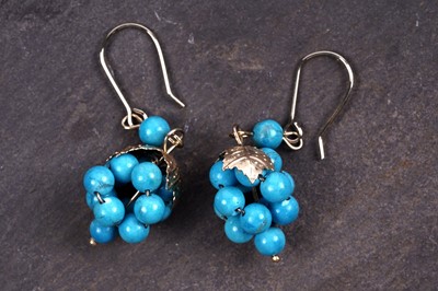 Lot 114 - A pair of turquoise set bunch of grapes pattern earrings