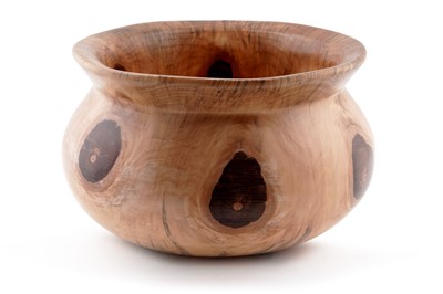 Lot 215 - A hand turned wooden monkey puzzle tree bowl