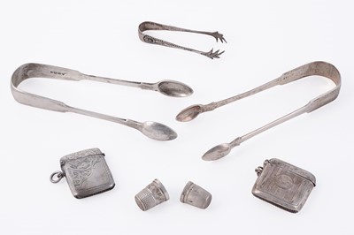 Lot 293 - Silver sugar tongs; and other items
