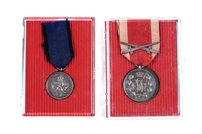 Lot 596 - Kreigs War Medal of Merit, and a Schaumburg-Lippe Combatant Merit medal