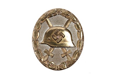 Lot 855 - A German Second World War gold grade wound badge