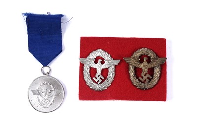 Lot 859 - German Third Reich period Police State civil cap badges and long service medal