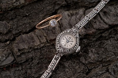 Lot 27 - A 1930's topaz single-stone ring; and a 1960s Ciro of Bond Street cocktail watch