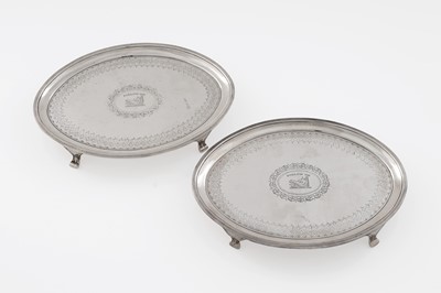 Lot 530 - A matched pair of George III Scottish silver salvers