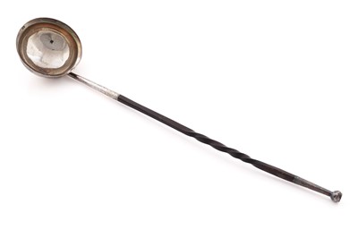 Lot 614 - A George III Scottish provincial silver punch ladle