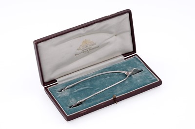 Lot 545 - A pair of George V Scottish provincial silver “wishbone” sugar tongs