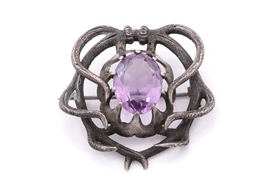 Lot 669 - A Victorian Scottish provincial silver and amethyst brooch