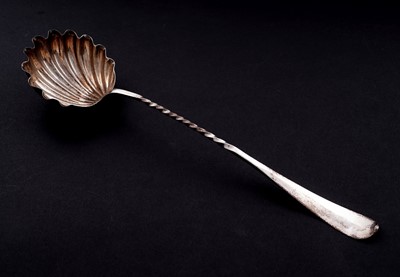 Lot 527 - A late George II Scottish silver soup ladle