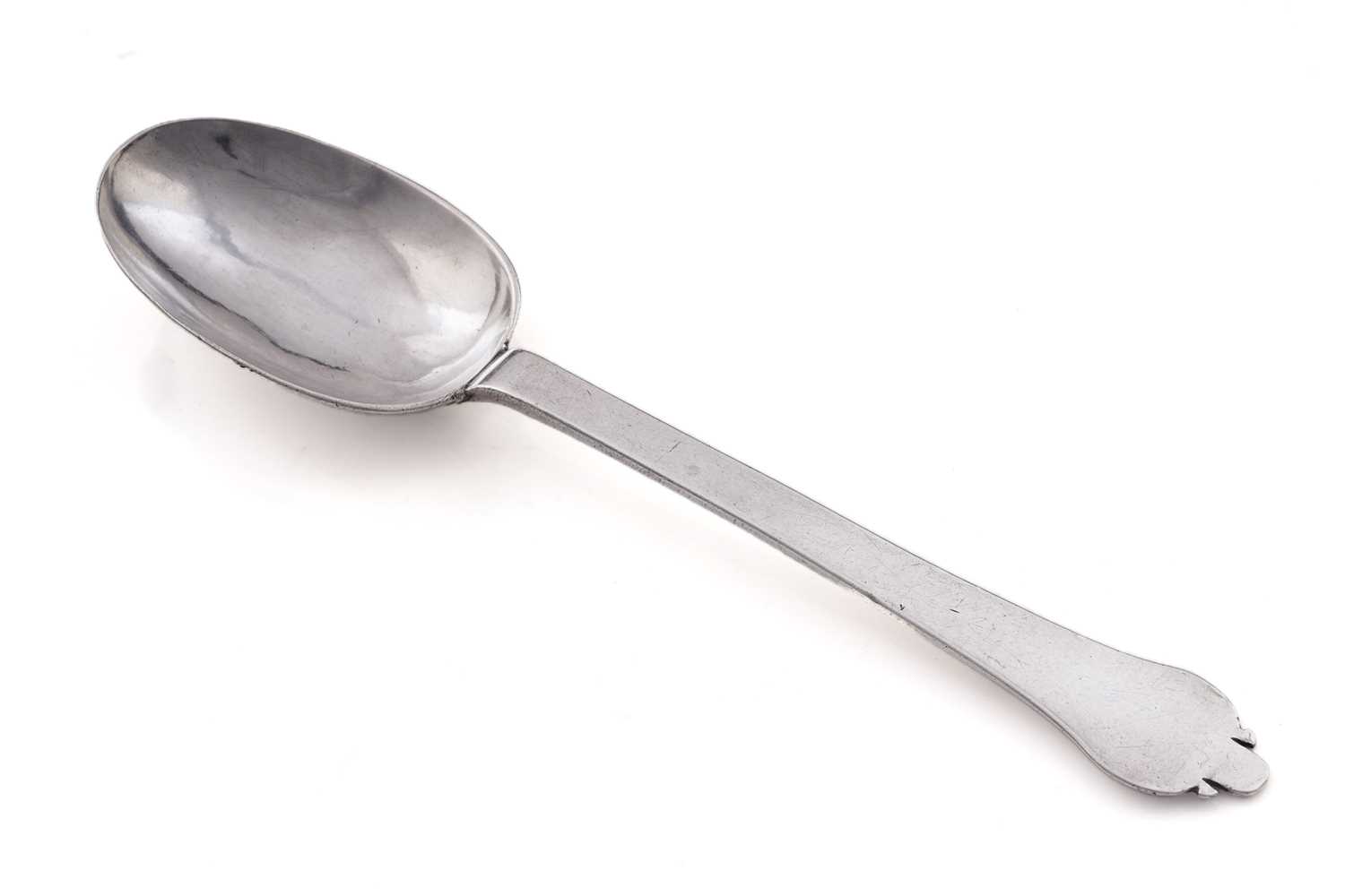 Lot 559 - A rare Charles II silver flame-back trefid spoon