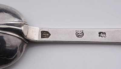Lot 559 - A rare Charles II silver flame-back trefid spoon