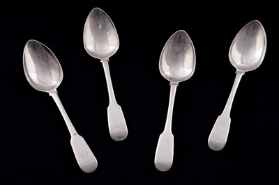 Lot 627 - A set of four George IV Scottish provincial silver dessert spoons