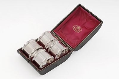 Lot 373 - An Edwardian cased set of four “numbered” napkin rings