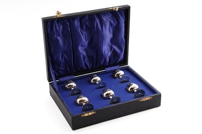 Lot 111 - An Edwardian cased set of six Edwardian silver tot cups