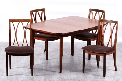 Lot 103 - G Plan: a teak extending dining table; and four chairs