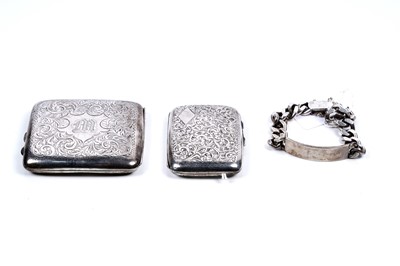 Lot 246 - Two silver cigarette cases; and an identity bracelet