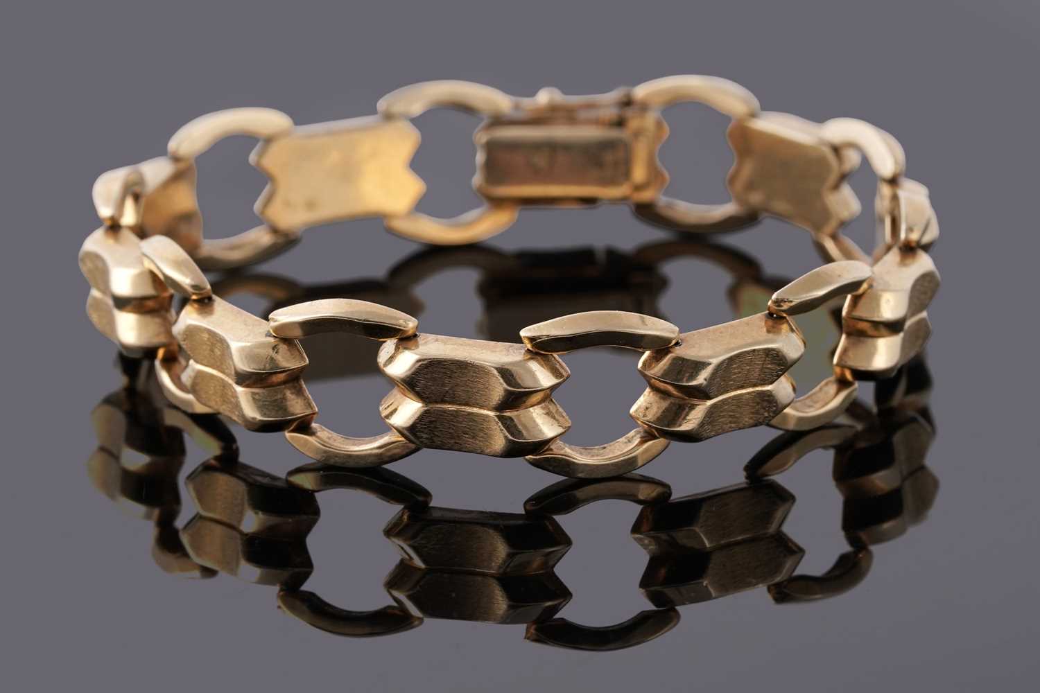 Lot 47 - A 1960's 18ct gold Modernist style fancy-link bracelet